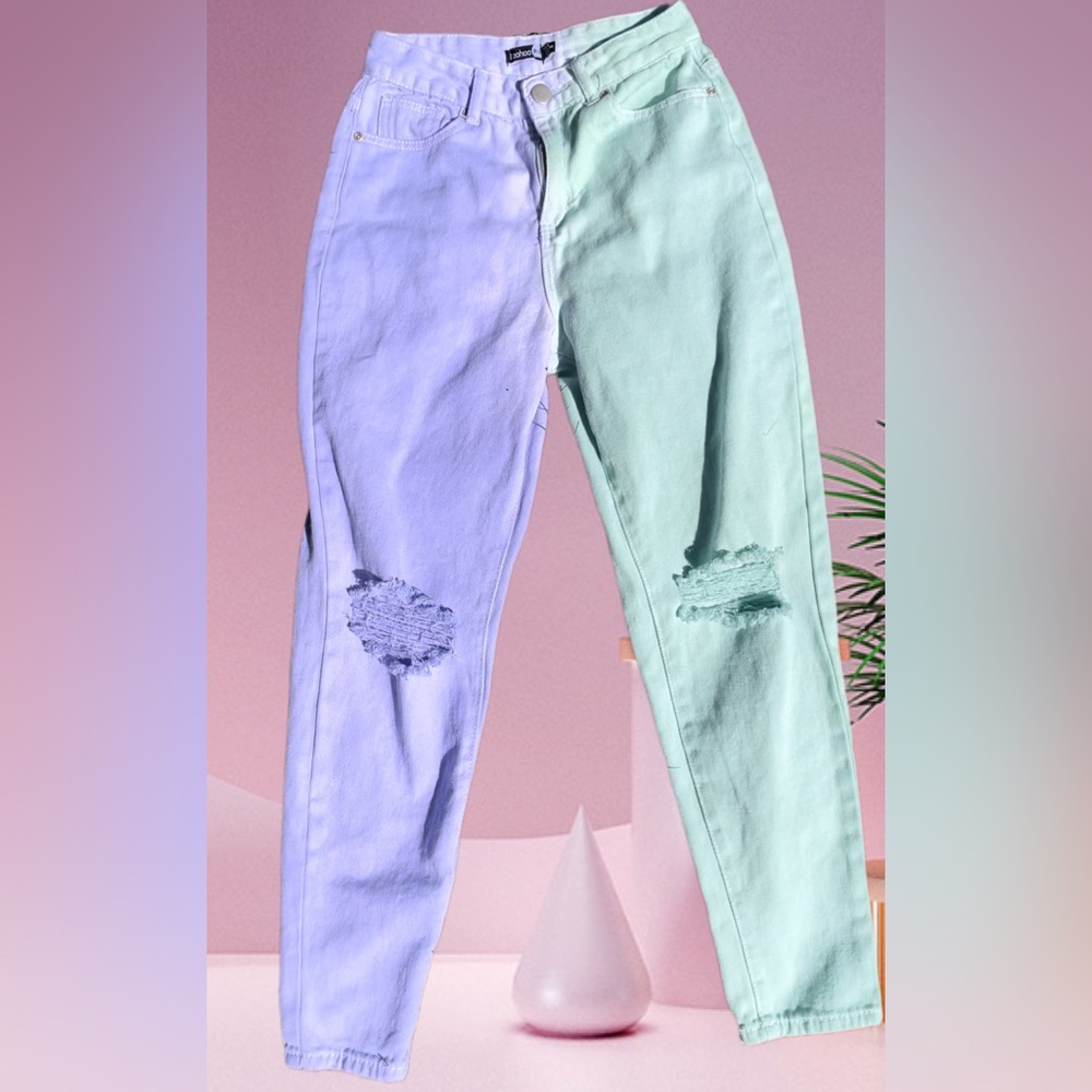 Hand dyed distressed high waisted boo boo slim fit jeans.  Runs small 4-6